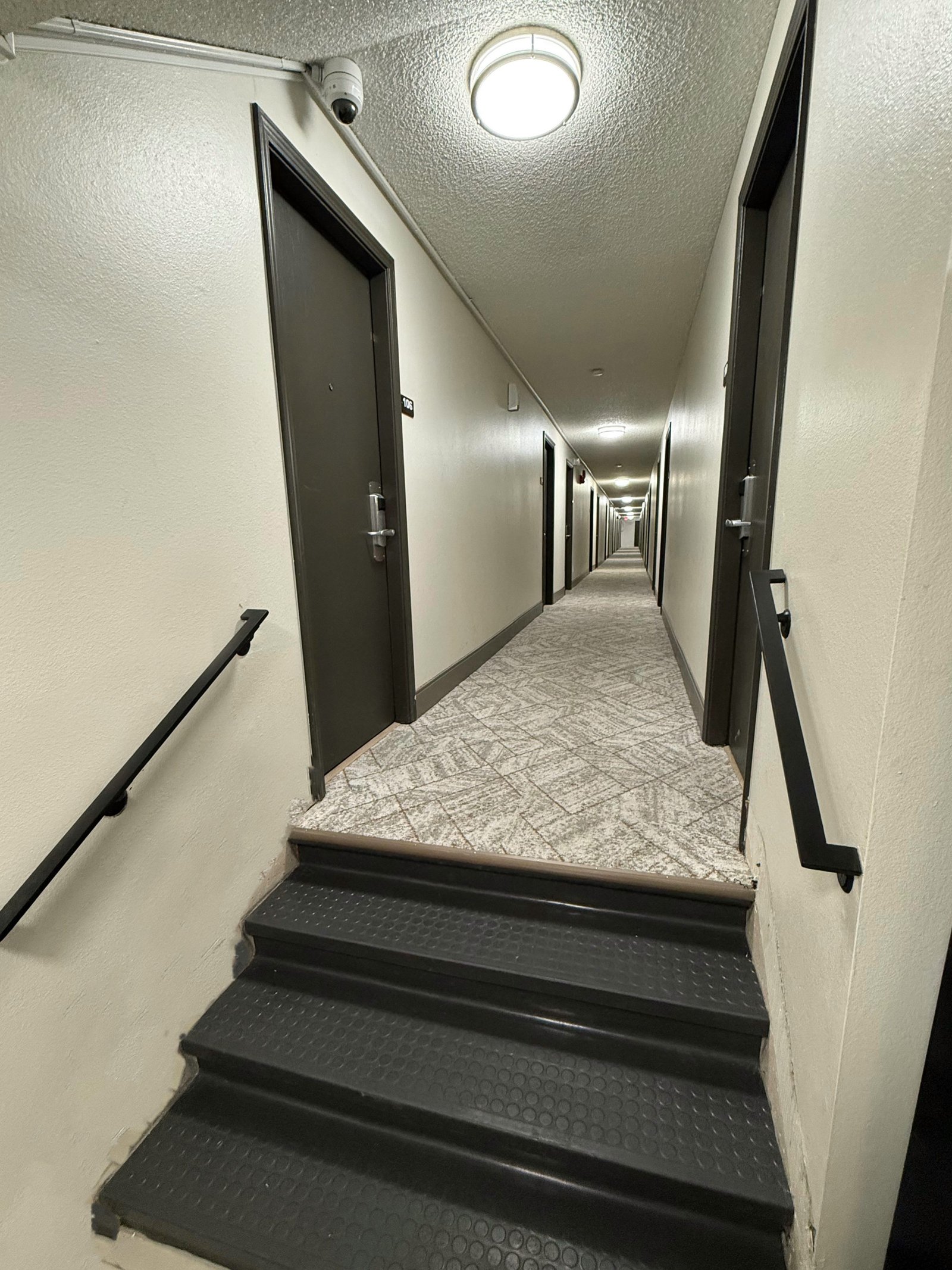 Hermiston Inn & Suites guest hallway leading to rooms