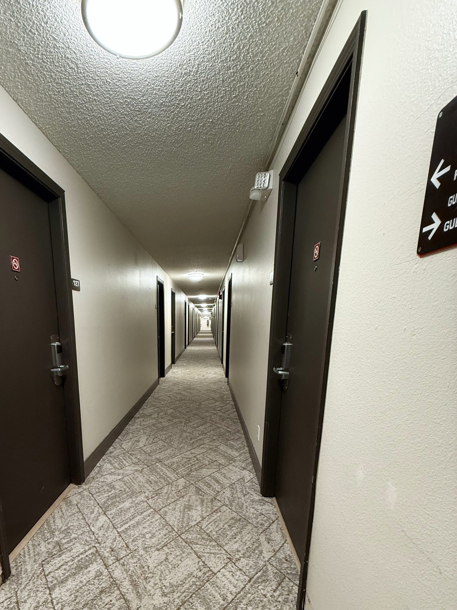Hermiston Inn & Suites guest hallway leading to rooms